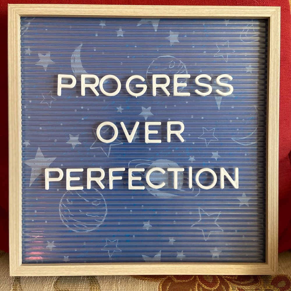 Letter board with outer space themed background
